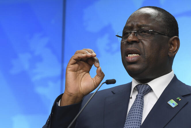 Senegalese President Macky Sall speaks to the press during a visit to Brussels, Belgium, February 18, 2022. 
