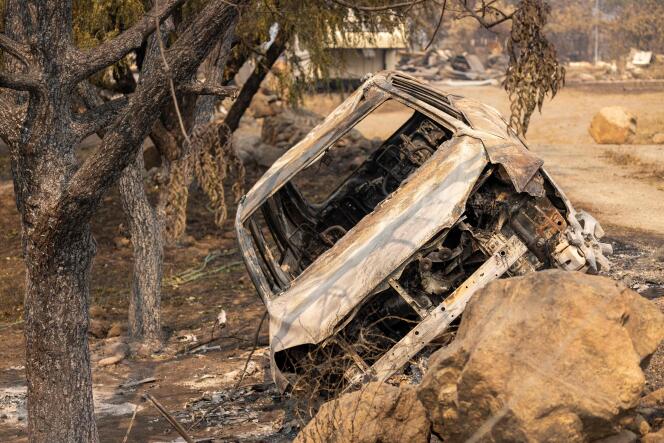 This photo taken on Aug. 2, 2022 shows a burned car where the bodies of two people were found Sunday in the Klamath National Forest near Yreka, Northern California.
