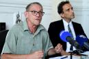 Paul Raoult (L), father of detained Sebastien Raoult, and his lawyer Philippe Ohayon (R) attend a press conference in Paris on August 2, 2022. Morocco detained French Sebastien Raoult wanted by the US for alleged involvement in cybercrime, a police source in the kingdom told AFP on July 29, 2022. (Photo by Bertrand GUAY / AFP)