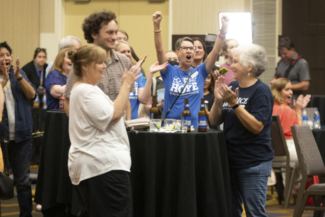 Abortion rights supporters rejoice as early poll results indicate that a proposed Kansas constitutional amendment has not passed, in Overland, Aug. 2, 2022.