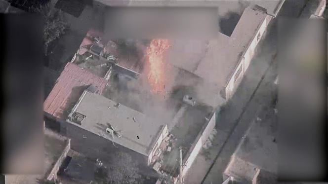 Image taken from a video shared by the US Department of Defense showing a fire that started after a drone strike, in Kabul, August 29, 2021.