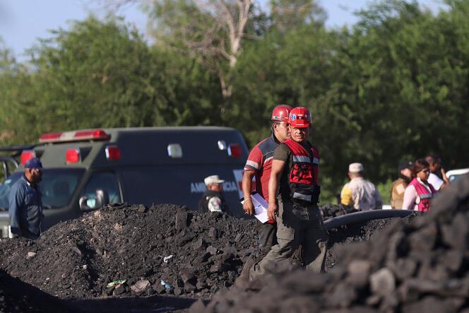 Rescue personnel work in the area of an accident at a coal mine, following a collapse which left -up to now- nine miners trapped, in the Agujita area, Sabinas municipality, Coahuila state, Mexico, on August 3, 2022.  
