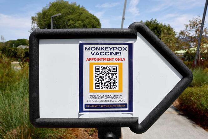A sign directs people toward a pop-up monkeypox vaccination clinic opened by the Los Angeles County Department of Public Health in West Hollywood, California, on August 4, 2022.