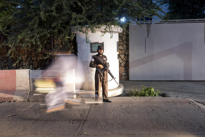 A Taliban guard at a checkpoint in central Kabul on August 3, 2022.