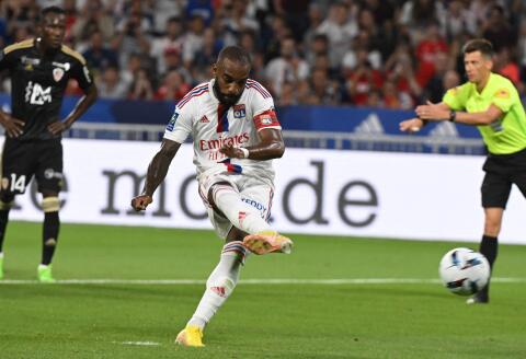 Lyon's French forward Alexandre Lacazette kicks to score his team's second goal on a penalty during the French Ligue 1 football match between Olympique Lyonnais (OL) and Ajaccio at The Groupama Stadium in Decines-Charpieu, central-eastern France, on August 5, 2022. (Photo by JEAN-PHILIPPE KSIAZEK / AFP)