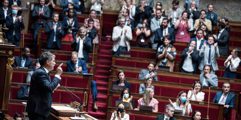 Paris, France, July 11, 2022 - The PS deputy, Olivier Faure, speaks during the motion of censure defended by the Nupes in the National Assembly while many Nupes deputies stand up to applaud him.