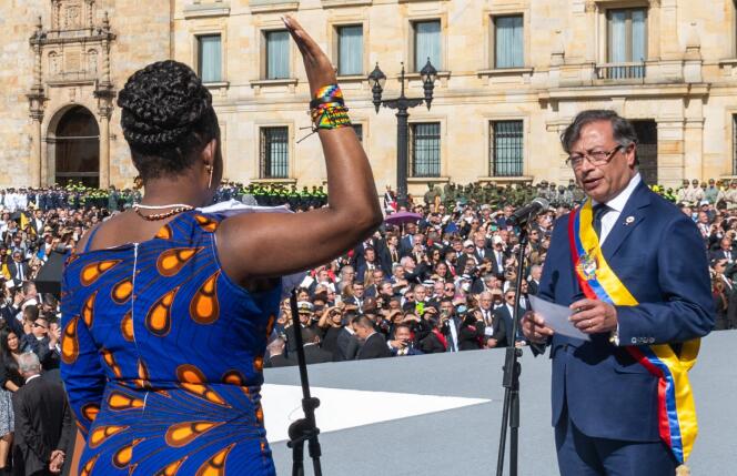 This photo released by the Presidential Press Office shows Colombia's new President Gustavo Petro swearing in before Vice President Francia Marquez during the opening ceremony at Bolivar Square in Bogota on August 7, 2022.