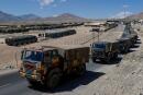 FILE PHOTO: Military trucks carrying supplies move towards forward areas in the Ladakh region, September 15, 2020. REUTERS/Danish Siddiqui/File Photo