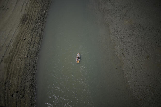 A paddle crosses a dry part of the Gorges du Verdon, in the south of France, on August 9, 2022. 
