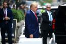 Former US President Donald Trump walks to a vehicle in New York City on August 10, 2022. Donald Trump on Wednesday declined to answer questions under oath in New York over alleged fraud at his family business, as legal pressures pile up for the former president whose house was raided by the FBI just two days ago. (Photo by STRINGER / AFP)