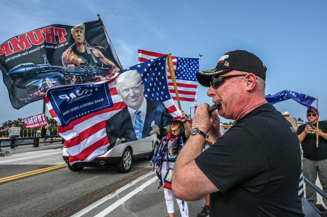 Supporters of former US president Donald Trump gather near his residence at Mar-A-Lago in Palm Beach, Florida, on August 9, 2022.
