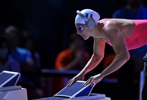 France's Marie Wattel prepares to compete in the women's 100m freestyle finals during the Budapest 2022 World Aquatics Championships at Duna Arena in Budapest on June 23, 2022. (Photo by Attila KISBENEDEK / AFP)