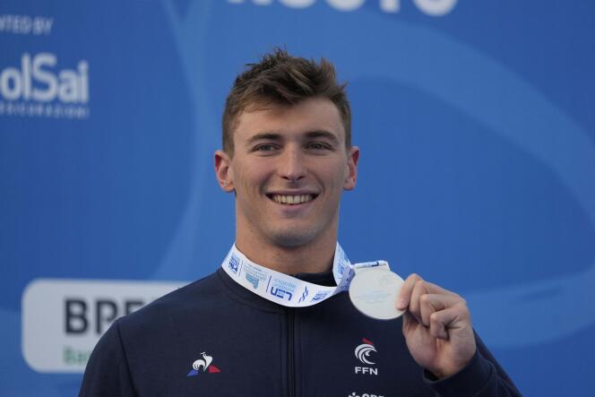 Frenchman Maxime Grousset, second, celebrates the end of the men's 50m butterfly final at the European Swimming Championships, in Rome, Friday August 12, 2022.