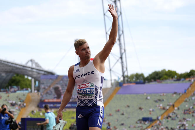 French decathlete Kevin Mayer waves to the public as he retires after the first event, during the European Athletics Championships in Munich, Germany, August 15, 2022.