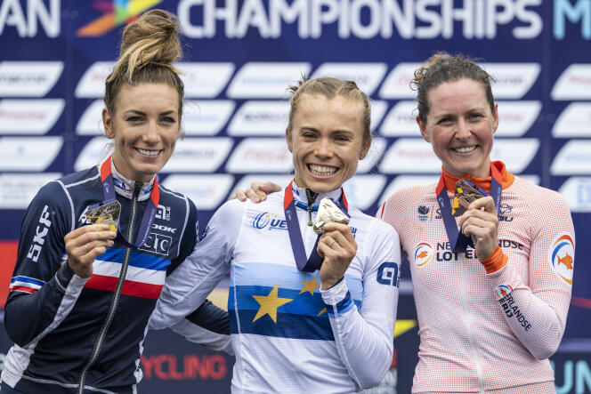 Left to right, Pauline Ferrand-Prévot of France, second, Loana Lecomte of France, first, and Dutch Anne Terpstra, third, pose with their medals after the women's mountain bike final of the European Championships in Munich, Germany, Saturday August 20, 2022.