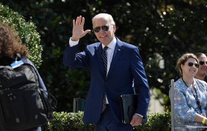 US President Joe Biden greets guests as he arrives on the South Lawn of the White House in Washington, DC, on August 24, 2022. 