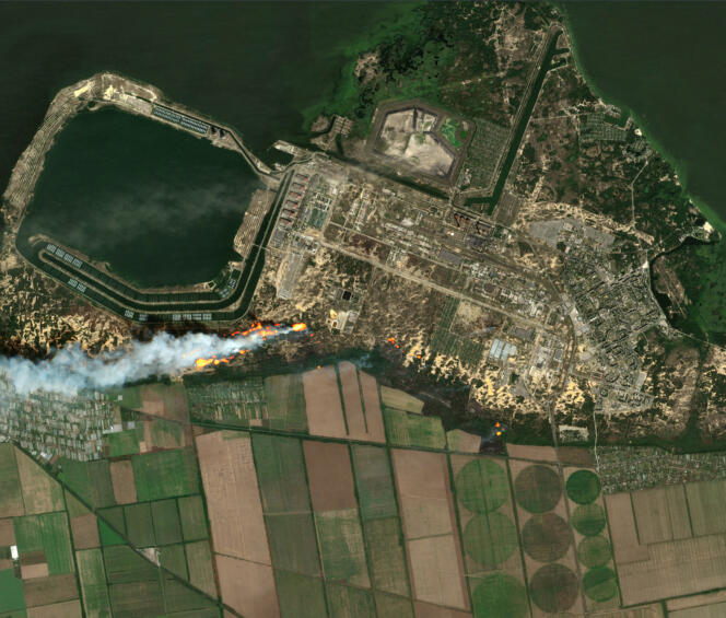 A satellite view of the Zaporizhia nuclear power plant (Ukraine) and the fire surrounding the site, Wednesday, August 24, 2022.