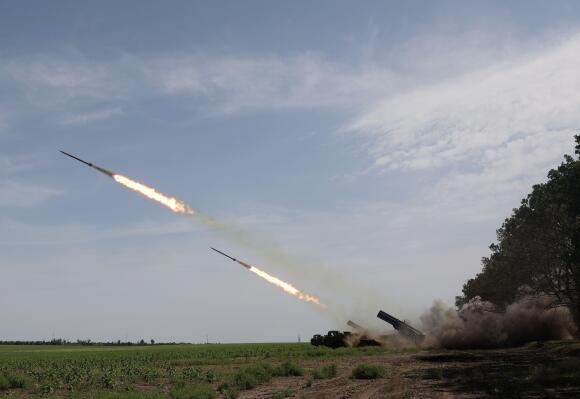 A Ukrainian artillery unit fires a BM-27 Ouragan, a 220 mm self-propelled rocket launcher, at a position near a front line in the Donetsk region on August 27, 2022.