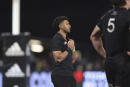 New Zealand's Richie Mo'unga tugs at his shirt after his team lost to Argentina in their Rugby Championship test match in Christchurch, New Zealand, Saturday, Aug. 27, 2022. (Martin Hunter/Photosport via AP)