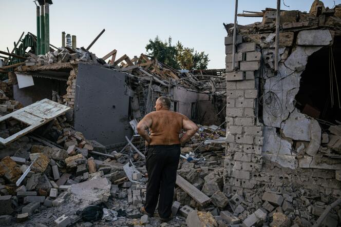 Oleksandr Shulga looks at his destroyed house following a missile strike in Mykolaiv on August 29, 2022, amid the Russian invasion of Ukraine. Ukrainian forces have begun a counter-attack to retake the southern city of Kherson, which is currently occupied by Russian troops, a local government official said on Monday.