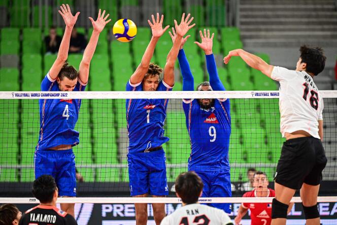 The French wall, composed from left to right of Jean Patry, Barthélémy Chinenyeze and Earvin Ngapeth, tries to block the Japanese Kento Miyaura, during the round of 16 disputed in Ljubljana (Slovenia), September 5, 2022.