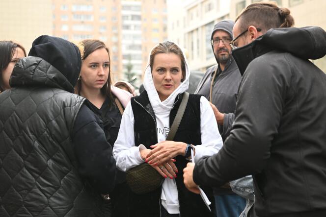 Former reporter Ivan Safronov's sister Irina (C) is seen outside the Moscow City Court following the verdict in Ivan Safronov's state treason trial, in Moscow on September 5, 2022.