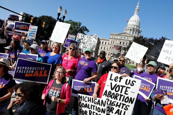 Pro-choice supporters gather outside the Michigan State Capitol during a 