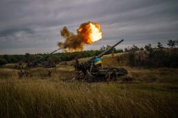 Ukrainian artillery unit fires with with a 2S7-Pion, a self-propelled gun, at a position near a frontline in Kharkiv region on August 26, 2022, amid the Russian invasion of Ukraine. (Photo by Ihor THACHEV / AFP)