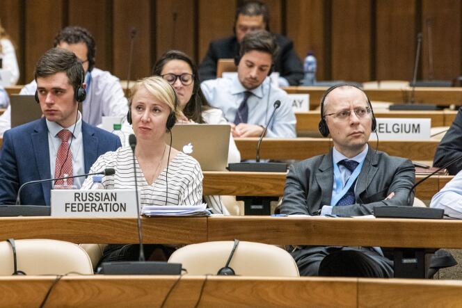 Russian diplomats, including Boris Bondarev (right), Russia's adviser to the United Nations, in Geneva on May 11, 2022. 