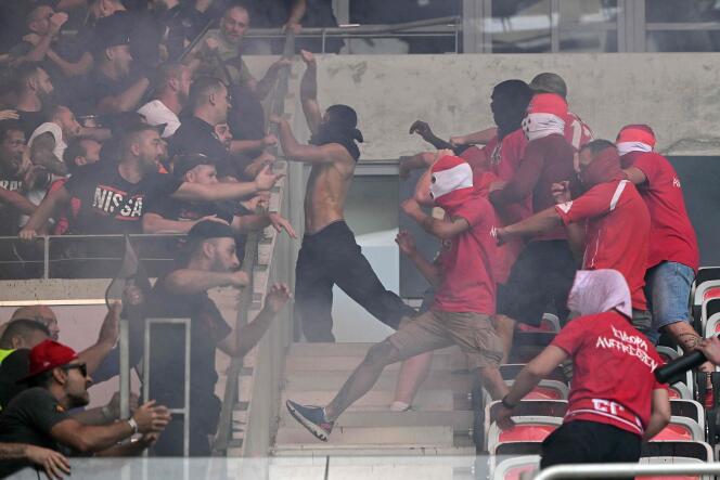 FC Cologne and Nice's supporters fight ahead of the UEFA Europa Conference League football match between Nice and FC Cologne at the Allianz Riviera in Nice, on September 8, 2022.  