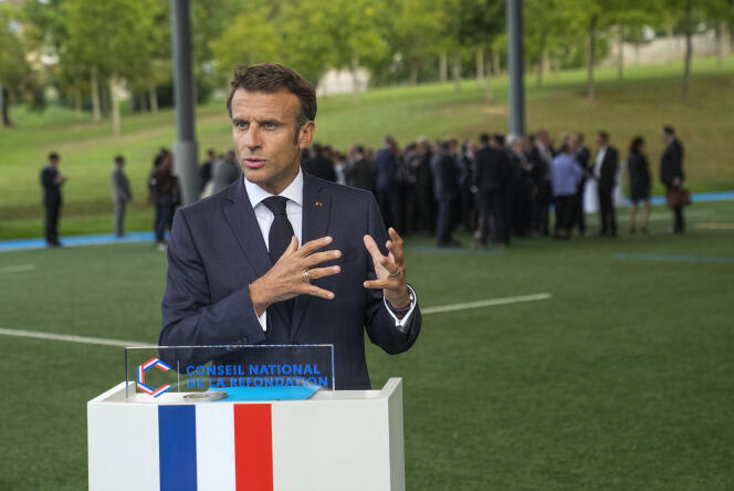 French President Emmanuel Macron gestures as he speaks to the media prior to the start of the transforming France event at the Rugby Union National Centre in Marcoussis, south of Paris, Thursday, Sept. 8, 2022. 