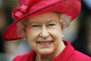 (FILES) In this file photo taken on April 21, 2006 Britain's Queen Elizabeth II smiles as she walks along Windsor High Street as part of her 80th Birthday celebrations. Queen Elizabeth II, the longest-serving monarch in British history and an icon instantly recognisable to billions of people around the world, has died aged 96, Buckingham Palace said on September 8, 2022. Her eldest son, Charles, 73, succeeds as king immediately, according to centuries of protocol, beginning a new, less certain chapter for the royal family after the queen's record-breaking 70-year reign. (Photo by Adrian DENNIS / AFP)