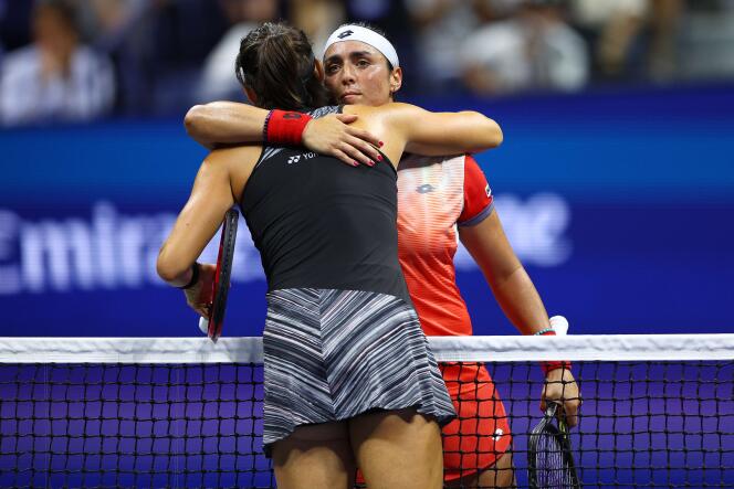 Ons Jabeur and Caroline Garcia hug after the US Open semi-final in New York on September 9, 2022.
