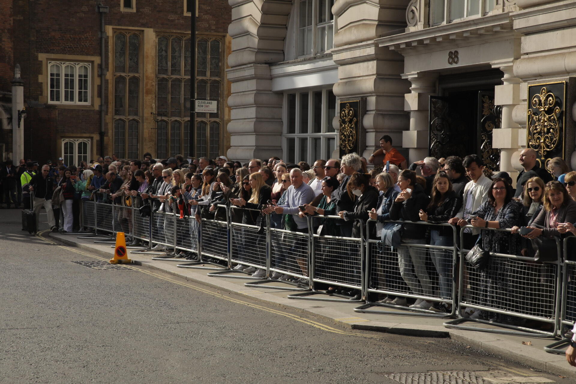 Crowds wait outside St James's Palace during the proclamation of King Charles III in London on the morning of September 10, 2022.