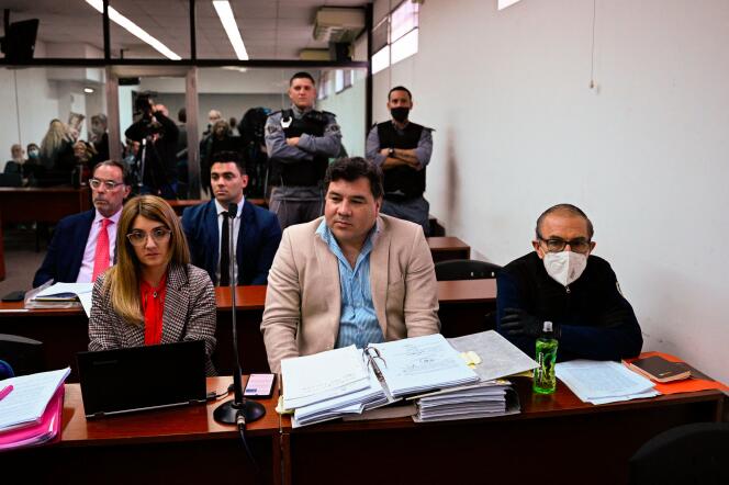 Former policeman Mario Sandoval (right), suspected of kidnapping a 24-year-old student during the dictatorship, attends the start of his trial in Buenos Aires, September 14, 2022.