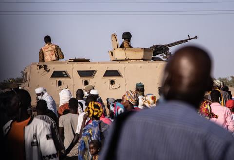 A military vehicle is seen at Burkina Faso’s incumbent President Roch Marc Christian Kaboré’s rally, in Dori on November 10, 2020, during presidential campaign ahead of the November 22, 2020 presidential elections. (Photo by OLYMPIA DE MAISMONT / AFP)