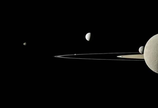 Photo taken by the Cassini spacecraft on July 29, 2011 showing Saturn, its rings and five of its moons. 