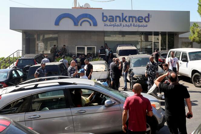 Police and army stand guard outside a Bankmed bank branch in Chehime, Lebanon, September 16, 2022.