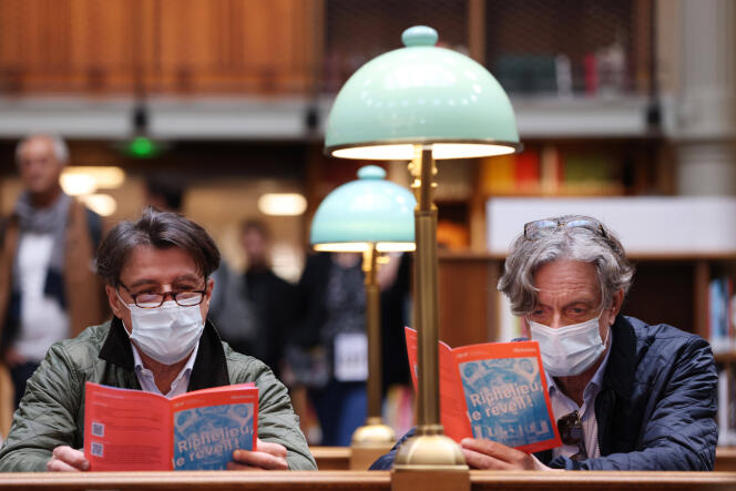 Visitors wear masks at the National Library of France on September 18