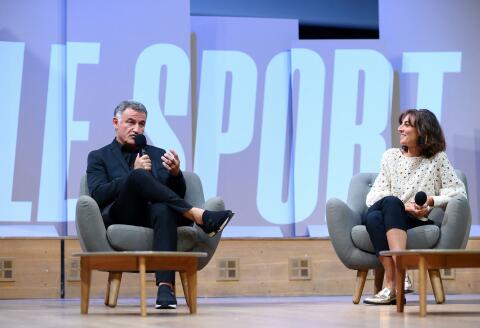 Paris Saint-Germain's French head coach Christophe Galtier (L) and French journalists Nathalie Iannetta participate in a debate on the occasion of an event dubbed "Demain le sport" (Sports tomorrow), in Paris on September 22, 2022. The swimming legend and multi-Olympic champion Michael Phelps will be present to talk about his extraordinary career as a sportsman. (Photo by FRANCK FIFE / AFP)