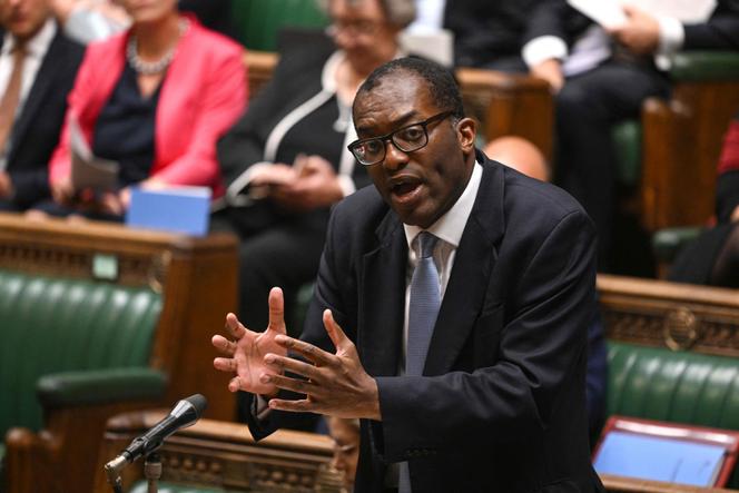 Chancellor of the Exchequer Kwasi Kwarteng presents his 