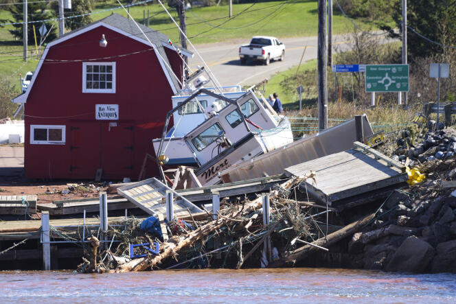 Among the extensive damage caused by Fiona, a boat lies on debris, in Prince Edward Island, Canada, September 25, 2022.