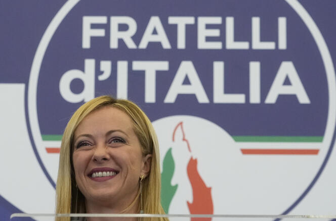 Giorgia Meloni speaks to the media at her party's electoral headquarters in Rome, on Sunday, Sept. 25, 2022.