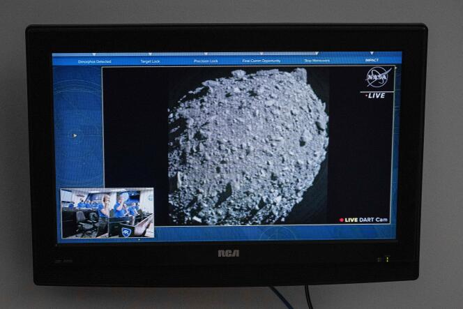 A television at NASA's Kennedy Space Center in Cape Canaveral, Florida, captures the final images from the Double Asteroid Redirection Test (DART) just before it smashes into the asteroid Dimorphos on September 26, 2022.