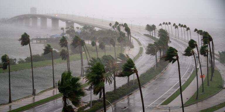 SARASOTA, FL - SEPTEMBER 28: Wind gusts blow across Sarasota Bay as Hurricane Ian churns to the south on September 28, 2022 in Sarasota, Florida. The storm made a U.S. landfall at Cayo Costa, Florida this afternoon as a Category 4 hurricane with wind speeds over 140 miles per hour in some areas. Sean Rayford/Getty Images/AFP