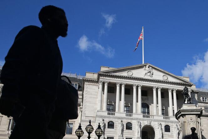 A UK flag flies over the Bank of England in London on September 29, 2022. 