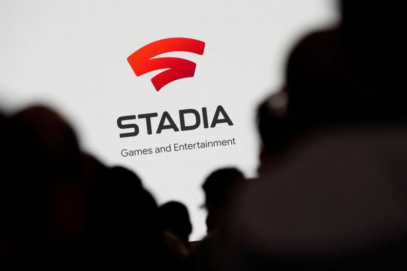 FILE PHOTO: Spectators look on during a Google keynote address announcing a new video gaming streaming service named Stadia that attempts to capitalize on the company's cloud technology and global network of data centers, at the Gaming Developers Conference in San Francisco, California, U.S., March 19, 2019. REUTERS/Stephen Lam/File Photo