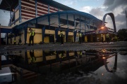 Police officers stand guard outside Kanjuruhan Stadium in Malang, East Java, on October 2, 2022 where about 125 people died as fans panicked.