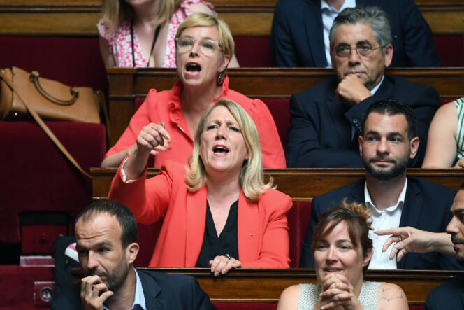 Deputies of La France insoumise, including the elected Danielle Simonnet (in the center, second row) and Clémentine Autain (in the center, third row), react during a session of questions to the government at the National Assembly, in Paris, on July 12, 2022.