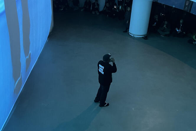 Kanye West addressing the audience, in a T-shirt with the provocative message 'White Lives Matter' on October 3, 2022.
